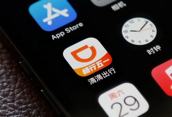 滴滴退市后首份年报：营收下滑，亏损收窄